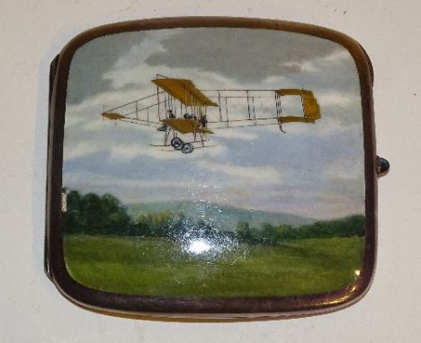 A Sterling silver and enamel cigarette case, stamped Sterling 935, with enamelled image of an early Wright Brothers style pla