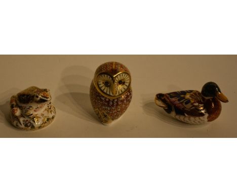 Three Royal Crown Derby animal paperweights, in the form of an owl, frog and duck, with button stoppers to underside, 7, 8 & 