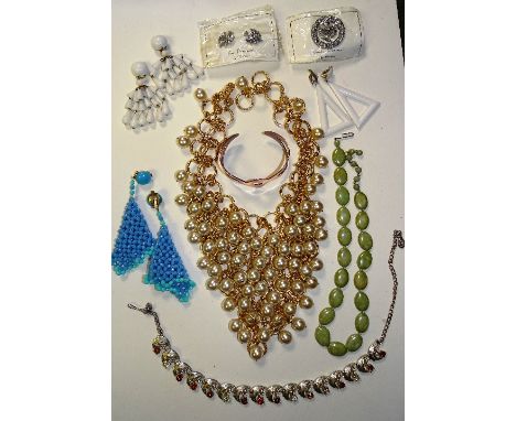 A small collection of 1960's costume jewellery, to include a large faux pearl and gold metal choker necklace, three pairs of 