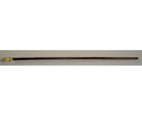 A bamboo walking stick, with ivory carved soldiers head pommel, circa late 19th century, 95cm long