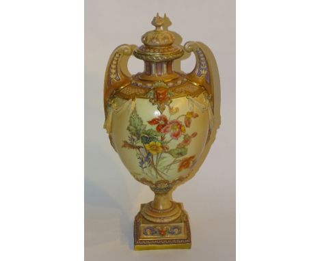 A large Royal Worcester baluster shaped blush vase with cover, circa early 20th century, with swan shaped handles above masks