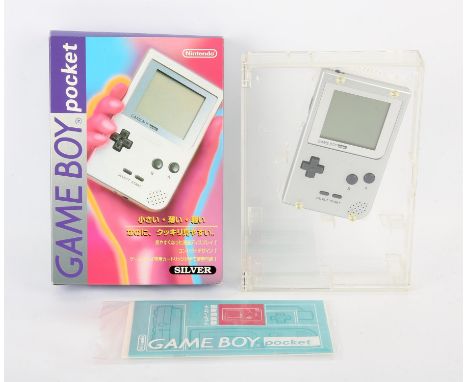 Nintendo Game Boy Pocket Silver Console w/Box, Manual and protective case Condition Report:  Console is boxed and in excellen