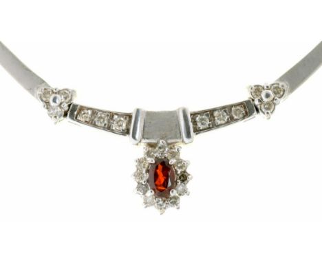 A GARNET AND DIAMOND NECKLET, IN WHITE AND YELLOW GOLD MARKED 14K, 15.5G++LIGHT WEAR CONSISTENT WITH AGE 