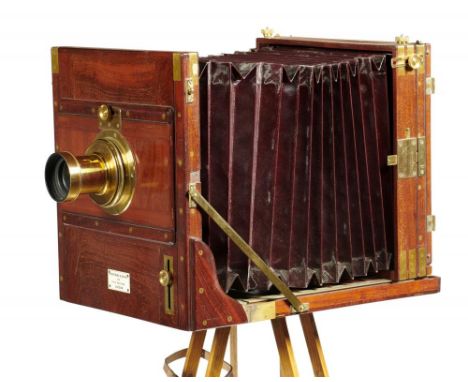 A VICTORIAN BRASS MOUNTED MAHOGANY 10 X 8 INCH FIELD CAMERA W WATSON &amp; SONS 313 HIGH HOLBORN LONDON, C1890, with maker's 