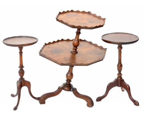 AN OCTAGONAL YEW WOOD OCCASIONAL TABLE AND TWO REPRODUCTION MAHOGANY TRIPOD TABLES 