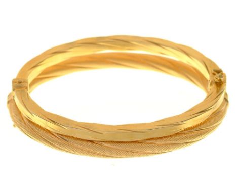 A 9CT GOLD BANGLE AND A GOLD BANGLE MARKED 375, 18G++LIGHT WEAR CONSISTENT WITH AGE