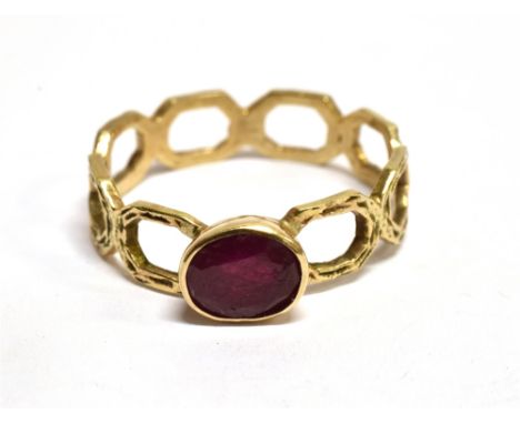 A RUBY SINGLE STONE SET DRESS RING Note: the ruby glass filled treated, gross weight 1.7 grams