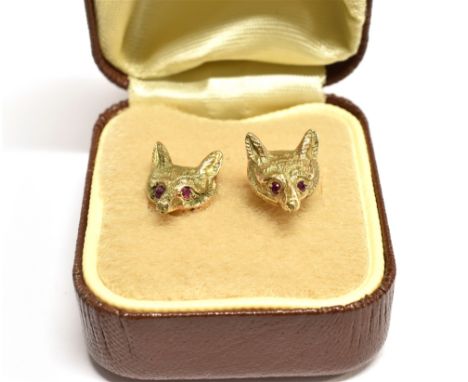 A C1950'S PAIR OF 9CT GOLD FOX HEAD STUD EARRINGS  Set with ruby eyes, each with 9ct gold fineness marks, post and butterfly 
