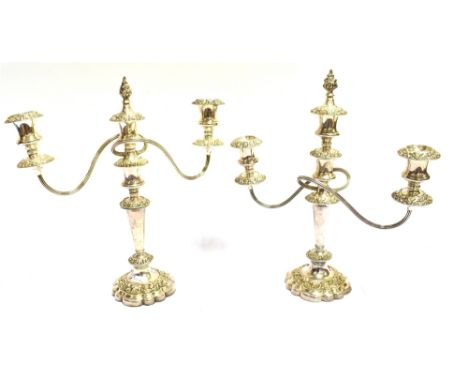 A PAIR OF SILVER PLATED THREE LIGHT CANDELABRA  with shell mark to base, together with a silver plated cushion shaped covered