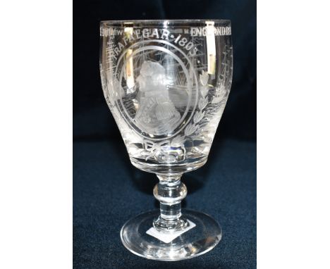 A 19TH CENTURY GLASS RUMMER  engraved with a portrait of Nelson and a Trafalgar scene, 16cm high