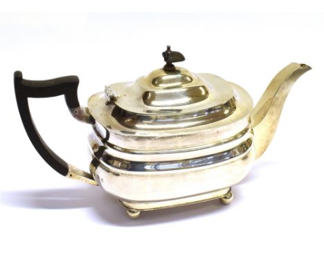 A SILVER TEAPOT  of plain cushion form with square spout, on four ball feet with redwood handle and knop (broken), hallmarks 