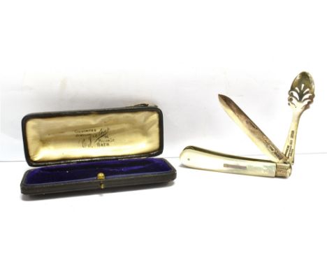 A BOXED SILVER BLADED FRUIT KNIFE AND SPOON COMBINATION  With mother of pearl handle, the pull out pierced spoon stamped PATE