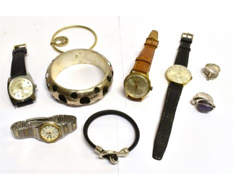 SIX ITEMS OF SILVER JEWELLERY  comprising a large D profile modern slave bangle, a silver gilt wire bangle with drop, a black