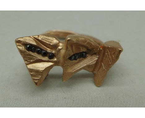A 9ct rose gold ring, Spiral Stars ring by Imogen Belfield with original box, 8.1g, M