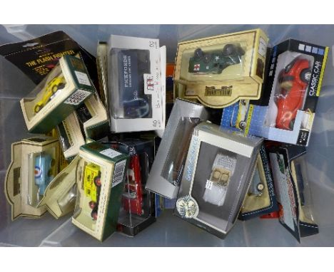 A collection of forty model vehicles, boxed
