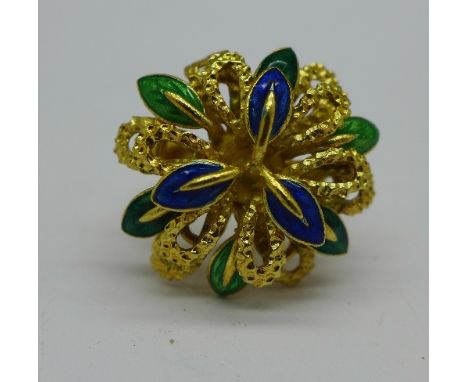 An 18ct gold, blue and green enamel flower design ring, 10.7g, I