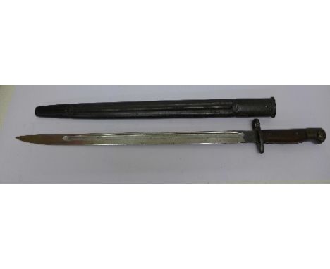 A 1907 pattern Enfield bayonet, re-stamped 7 '15 on blade and scabbard