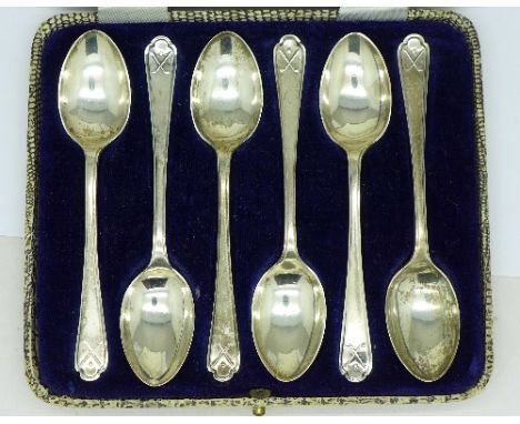 A cased set of six silver golf spoons, 81g