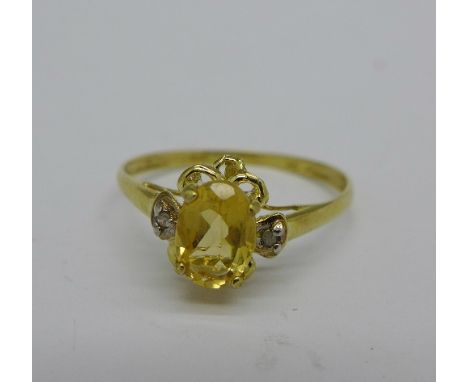 A 9ct gold, citrine and diamond ring, 1.1g, O