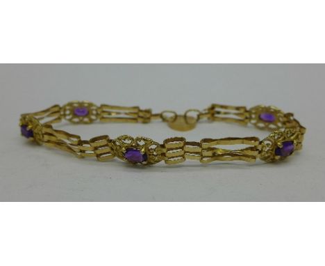 A 9ct gold and amethyst bracelet, 7g