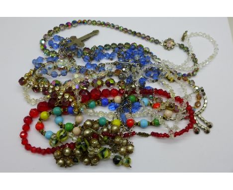 Eleven vintage necklets and a rosary