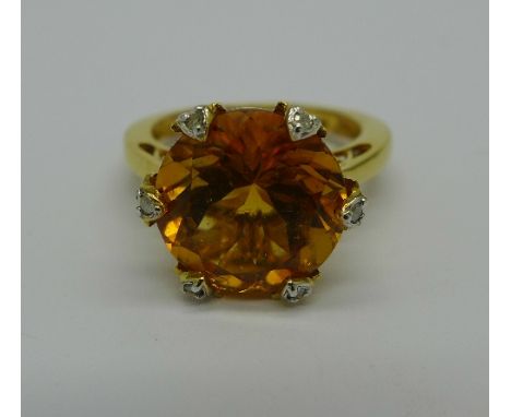 A silver gilt, citrine and diamond ring, N