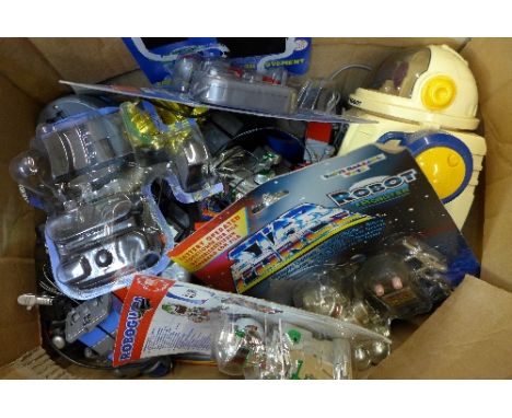 Assorted robot toys, some in blister packs