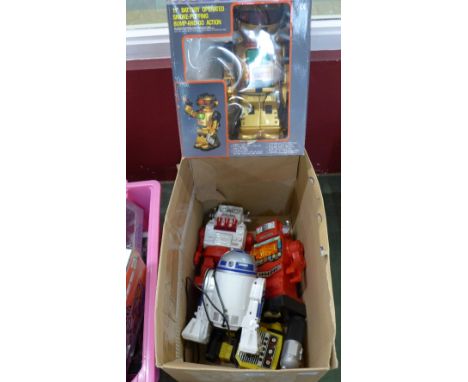 Four plastic robots including Robot King, boxed and R2D2