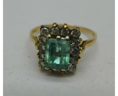 An 18ct gold, blue stone and diamond ring, 4g, Q