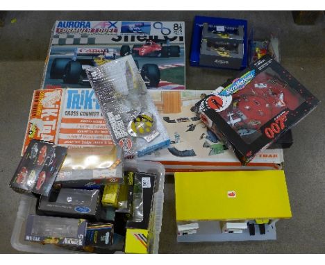 An Airfix Spitfire model kit, a Mini-Rama, a Micro Machines James Bond 007 set, Crookes Healthcare set, two military vehicles