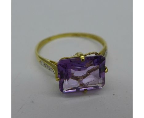 A 9ct gold, amethyst and diamond ring, 1.3g, O