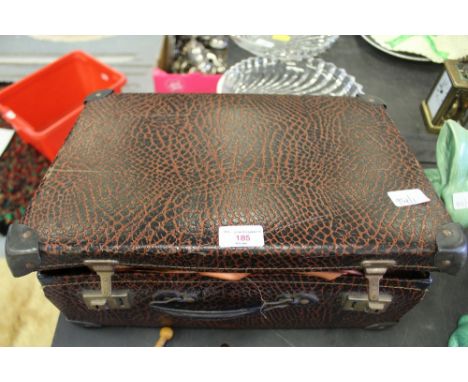 Suitcase containing Sari's and vintage textiles