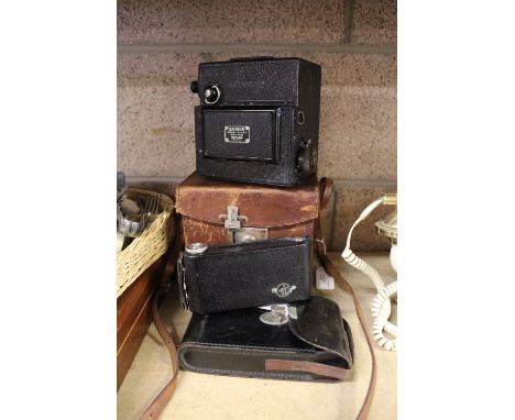 Leather cased Ensign camera and Kodak camera