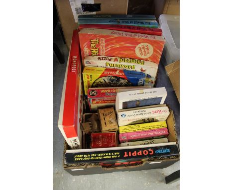 Box of vintage jigsaws etc