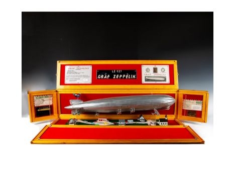 One-of-a-kind maquette featuring the 1929 Graf Zeppelin (over 3 feet long) that is set in a panoramic size custom made wooden