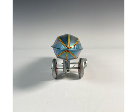Original Collector Series of a Zeppelin wind-up tin toy that is a replica of the 1929 original. The wind-up key releases the 