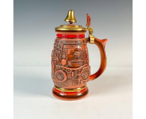 This majestic piece features a red glaze with high detailed firefighters scenes decorated with gold metal lid and accents. We