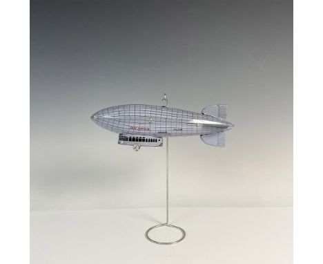 Original commemorative Graf Zeppelin tin toy with case from the American Postal Collection's A Century of Progress Flight in 