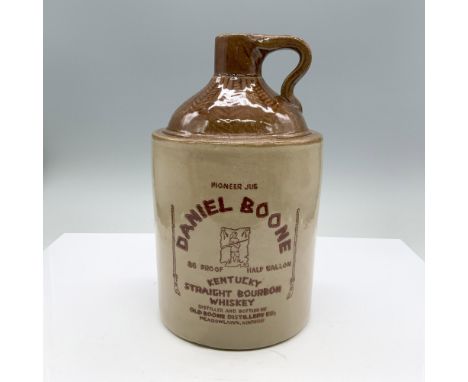 Jug with brown glossy top and handle with lighter brown base. Lettering advertising Kentucky Straight Bourbon Whiskey. Old Bo