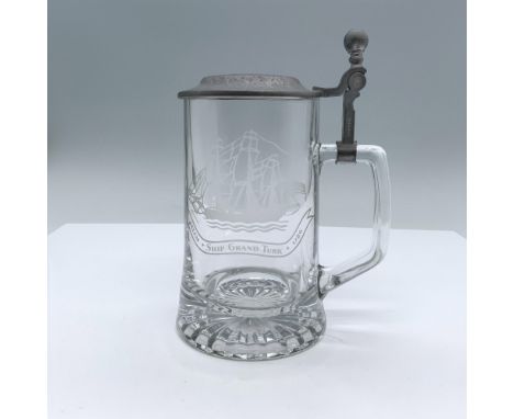 Clear glass beer mug featuring an etching of galleon and a banner marked: Salem, Ship Grand Turk, 1786. Compass embossed on t