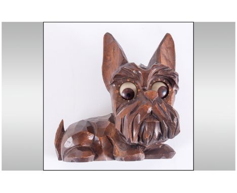 Vintage German Carved Wood Blinking Eye Scotty Dog Clockwork Figure, with humourous expression.