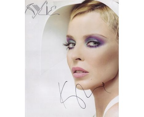 Kylie Minogue signed 10 x 8 colour photo of the Australian singer, songwriter, dancer and actress. She first came to our atte