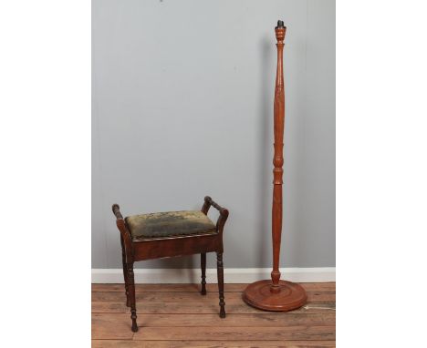 A Victorian CWS piano stool, with hinged seat raised on turned legs, together with a standard lamp base.  