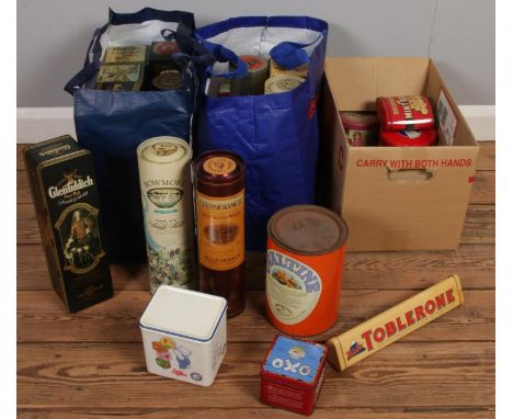 A collection of vintage tins. Including Glenfiddich, Cow &amp; Gate, Oxo, etc.  