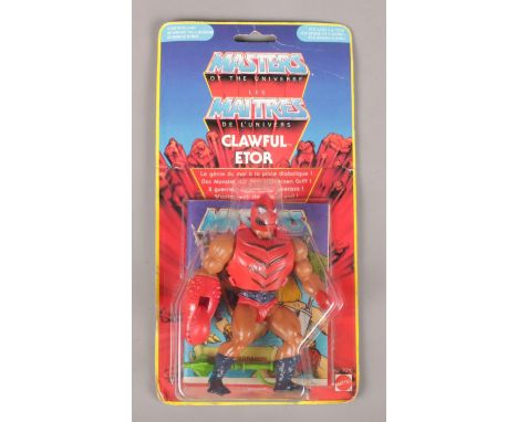 A boxed Mattel Masters of the Universe Clawful Etor action figure.  