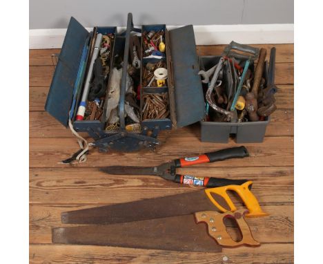A large quantity of tools, together with a cantilever toolbox.  