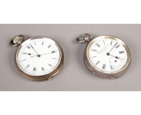 Two silver pocket watches, with engine turned backs; both stamped 925 to the inside of the case. One example with enameled fa