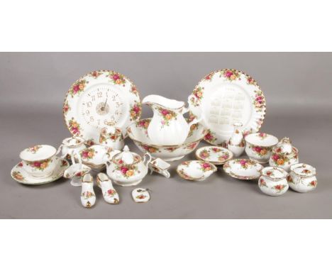 Twenty five assorted pieces of Royal Albert Old Country Roses. To include key ring, clock and date plate for 1999 etc.  Some 