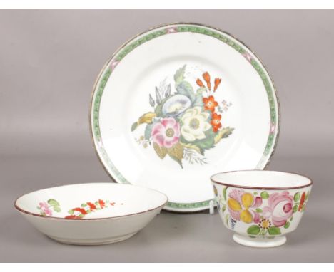 A Don pottery tea bowl and saucer painted in polychrome enamels, along with a Don Pottery plate printed and enamelled with fl