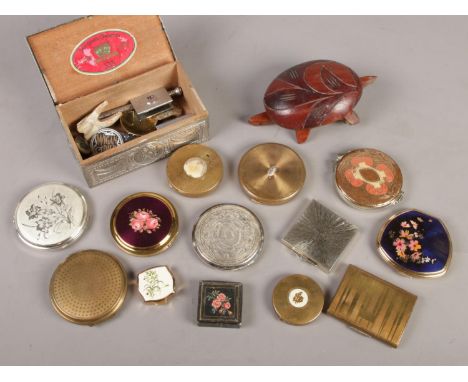 A small box of collectables. Includes compacts, cigarette box, propelling pencil, Wigan Pier badge etc.  
